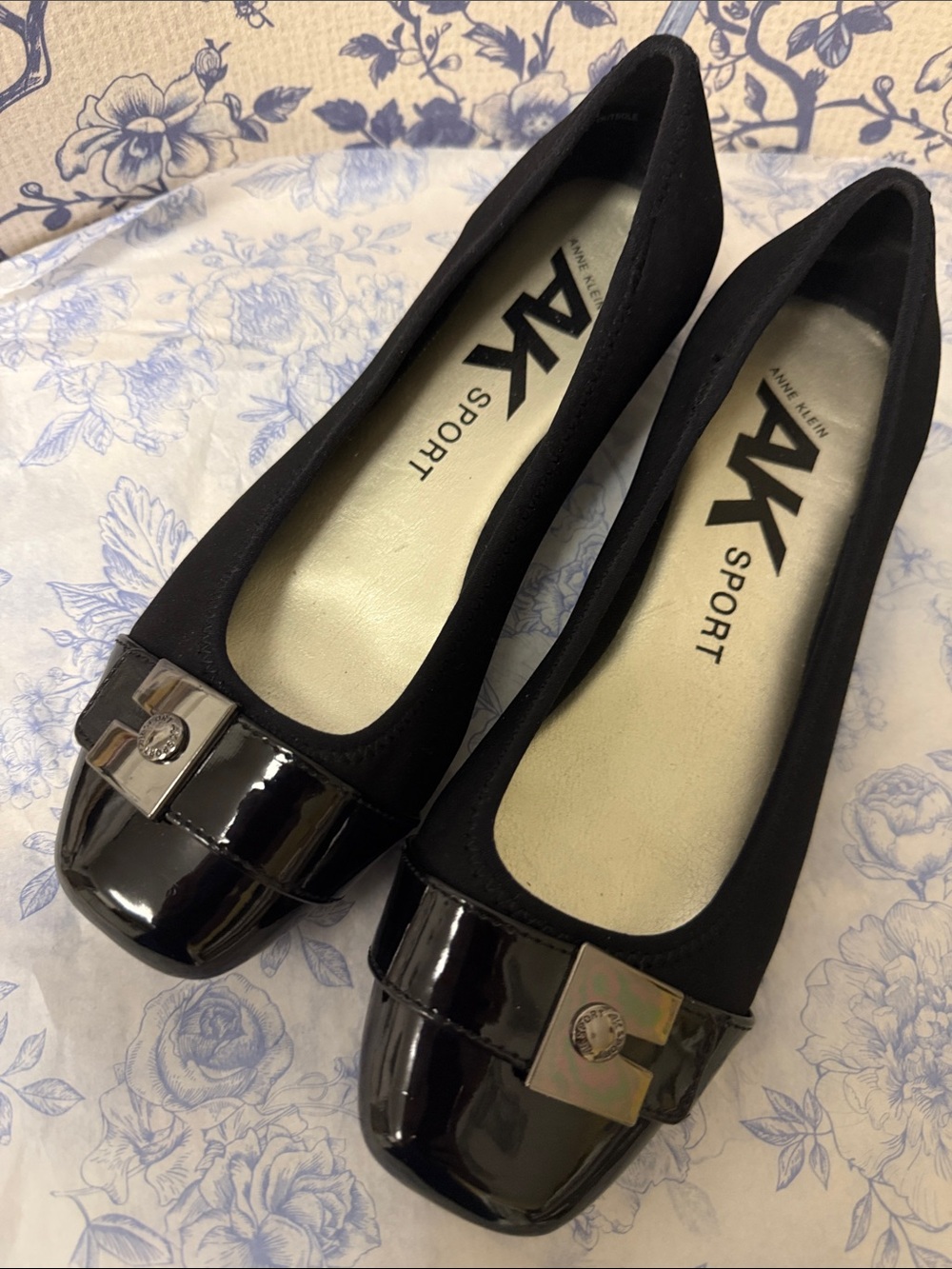 Anne Klein Black Patent Cap-Toe Ballet Flats with Metal Plaque